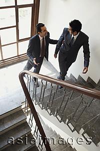 Asia Images Group - businessmen walking up the stairs