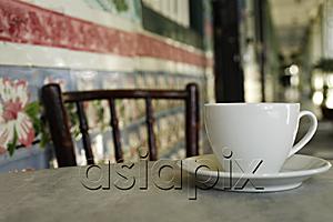 AsiaPix - Close up of coffee cup on marble table in China Town, Singapore.