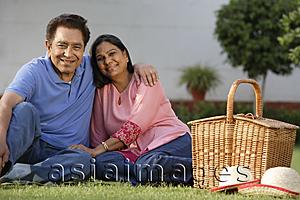 Asia Images Group - couple having picnic