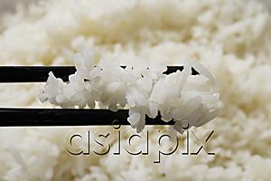 AsiaPix - close up chopstick holding rice