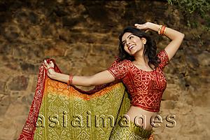 Asia Images Group - woman in sari dancing