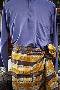AsiaPix - Closeup of baju melayu, traditional Malay attire for men.