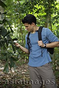 Asia Images Group - Man on a nature walk
