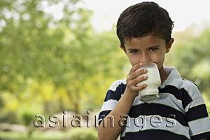 Asia Images Group - boy drinking glass of milk