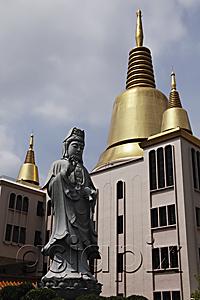 AsiaPix - Golden spires and Buddhist Statue