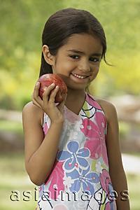 Asia Images Group - little girl with apple