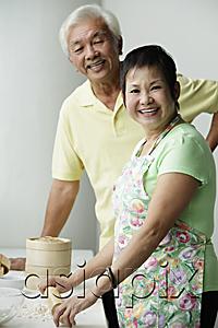 AsiaPix - Chinese couple cooking together and smiling