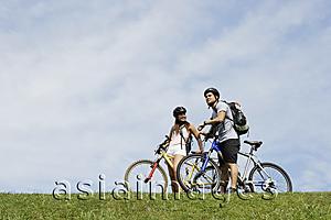 Asia Images Group - Couple on a bicycle ride