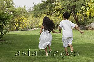 Asia Images Group - two little children running away