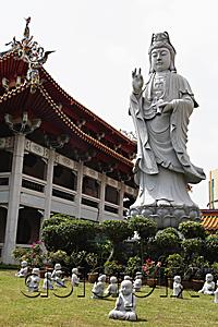 AsiaPix - Statues of Buddha in front of temple