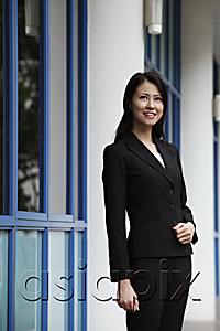 AsiaPix - Woman wearing a suit looking up