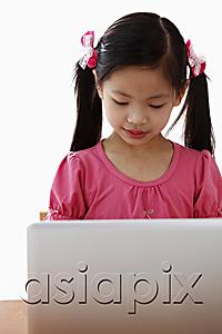 AsiaPix - Young Chinese girl looking at laptop