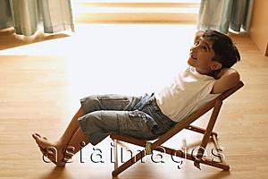 Asia Images Group - little boy in chair