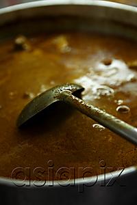 AsiaPix - Pot of fish curry. Malay food