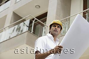 Asia Images Group - contractor with blueprints