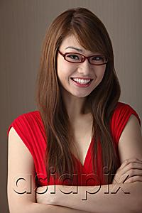 AsiaPix - Young woman in red dress and wearing red glasses