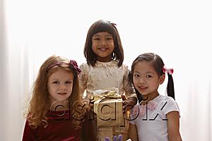 AsiaPix - three young girls smiling together