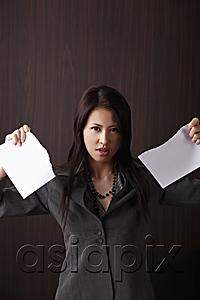 AsiaPix - woman ripping paper