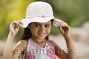 Asia Images Group - girl with big pink hat