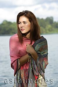 Asia Images Group - Young woman wrapped in shawl