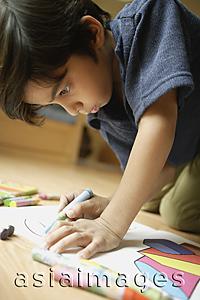 Asia Images Group - Little boy coloring
