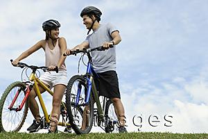 Asia Images Group - Couple on bicycles