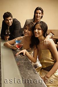Asia Images Group - young adults at a bar