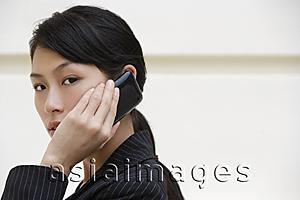 Asia Images Group - Businesswoman on mobile phone