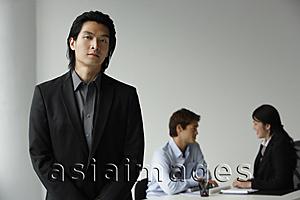 Asia Images Group - Business colleagues, businessman in foreground