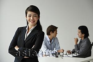 Asia Images Group - Business colleagues, businesswoman in foreground