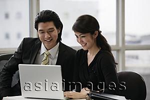 Asia Images Group - Business colleagues working at computer