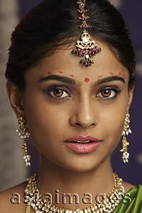 Asia Images Group - woman decorated with henna tattoos, jewelry and bindi