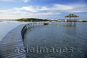 Asia Images Group - Footbridge with a nipa house in the resort, Siargao, Philippines