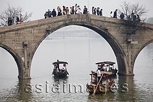 Asia Images Group - Tourists on excursion boats and on Fangsheng Bridge,  Zhujiajiao, China