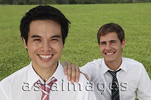 Asia Images Group - business man with hand on shoulder of another man