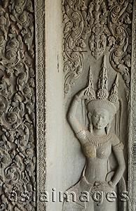 Asia Images Group - carved image of diety at Angkor Wat, Cambodia