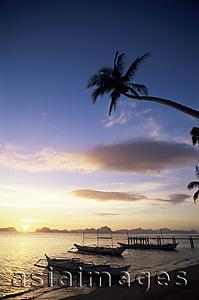 Asia Images Group - Philippines,Palawan,Bascuit Bay,El Nido,Outriggers on Tropical Beach at Sunset