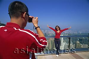 Asia Images Group - China,Hong Kong,Couple taking photos at Victoria Peak