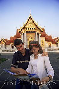 Asia Images Group - Thailand,Bangkok,Wat Benchamabophit,Tourist Couple in the Marble Temple