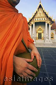 Asia Images Group - Thailand,Bangkok,Marble Temple,Wat Benchamabophit,Monk Holding Alms Bowl