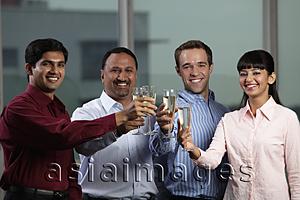 Asia Images Group - mixed raced group toasting each other