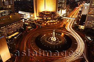Asia Images Group - Evening view of Hotel Indonesia roundabout, Welcome Monument along Jalan Thamrin, Jakarta