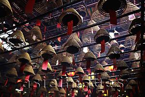 Asia Images Group - Incense coils hanging from ceiling of Man Mo Temple, Hong Kong