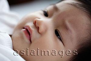 Asia Images Group - head shot of sleepy baby