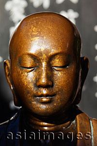 Asia Images Group - Bronze head of Buddha statue. Asakusa Kannon Temple, Japan