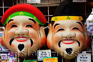 Asia Images Group - Souvenir Lucky God Masks. Asakusa, Japan, Nakamise Dori Shopping Street.