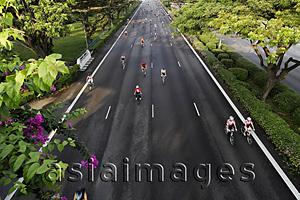 Asia Images Group - Top view of People riding bikes during a bike race