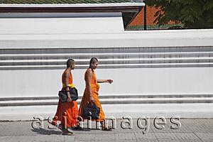 Asia Images Group - Monks walking along street in Bangkok, Thailand