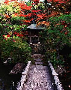 Asia Images Group - Japan, Kyoto, small stone bridge leading to domestic shrine