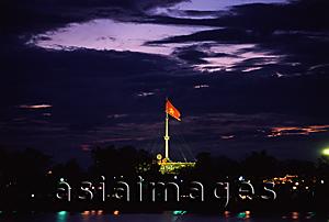 Asia Images Group - Vietnam, Hue, Flag at night across the Perfume River